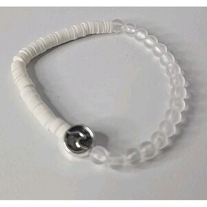 Heishi Bead Bracelet with a sterling silver wave charm Stretchable